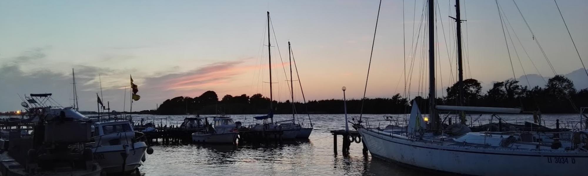 Tramonto sulla foce dell'Arno (L. Corevi, Comune di Pisa)